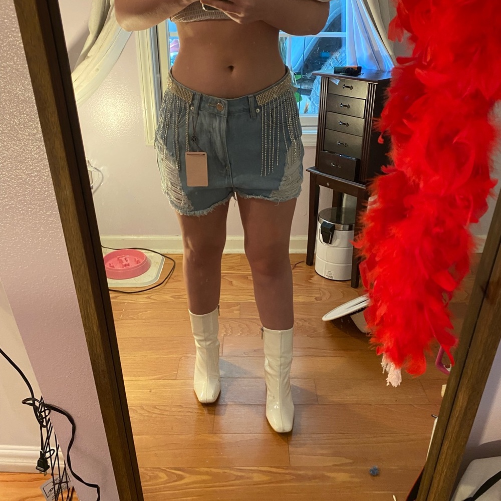 Jean shorts perfect for a concert or a night out. Never worn, still has tags